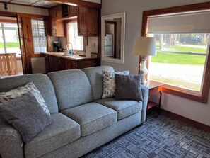 Family Cottage, 2 Bedrooms, Garden View, Lakeside | Living area | Flat-screen TV, DVD player - Mission Springs Resort (Ashland)