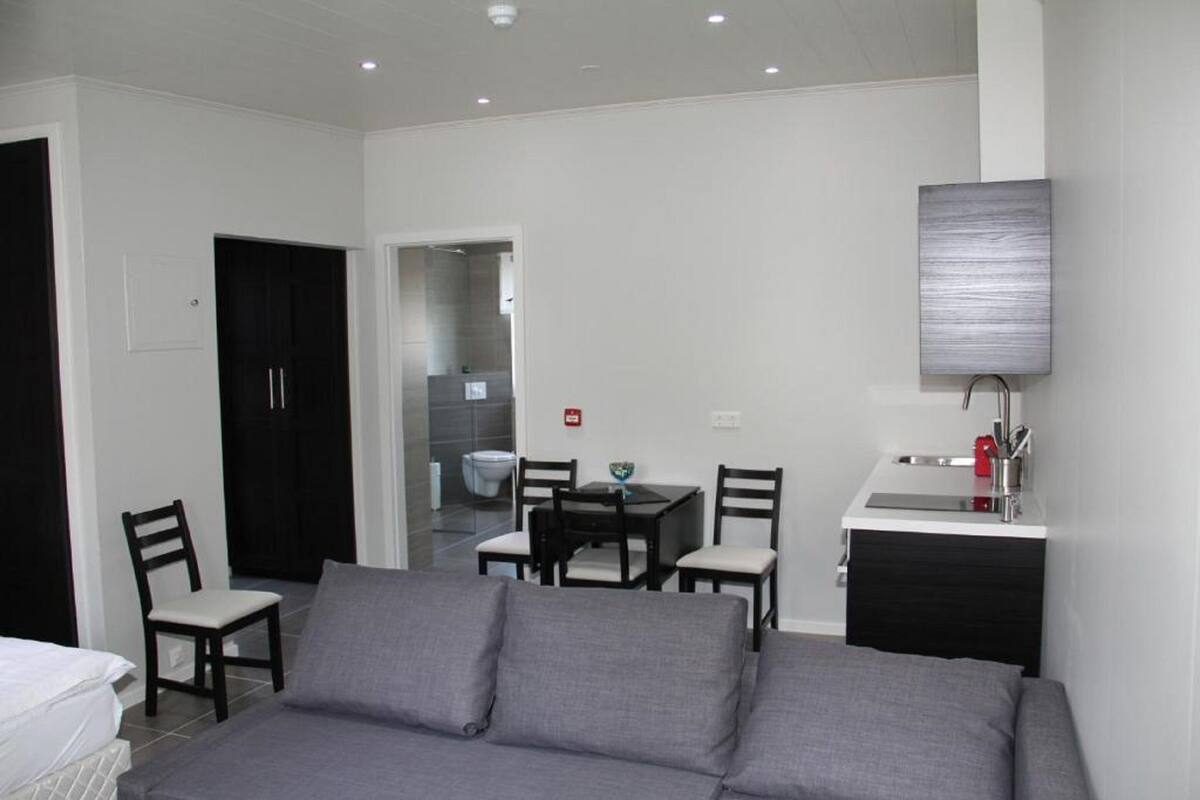 family studio | living area | flat-screen tv