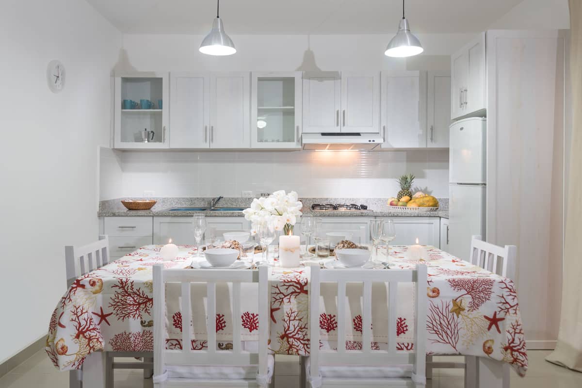 Family Suite Two Bedrooms & Two Bathrooms | Living area | Flat-screen TV