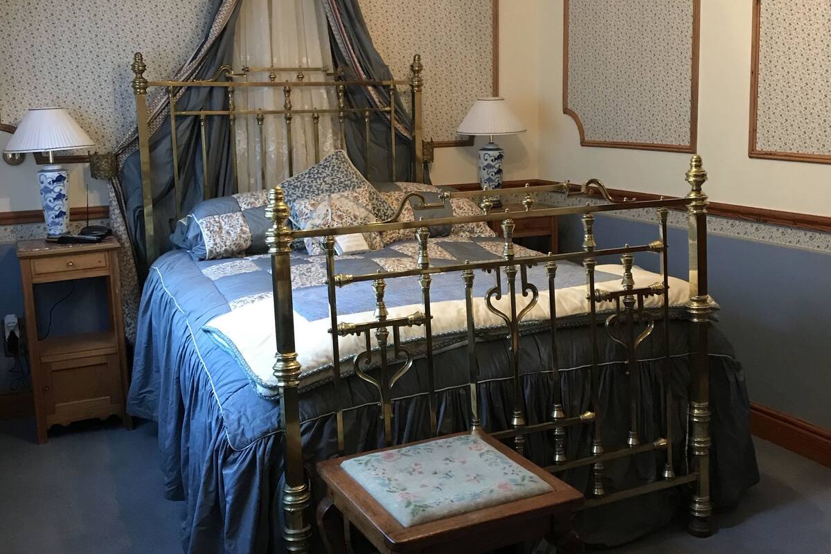 The Blue Bedroom | Individually decorated, individually furnished, blackout drapes