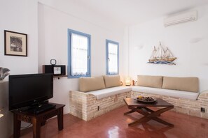Villa, 3 Bedrooms, Private Pool, Sea View (Daphne) | Living area | Plasma TV, DVD player - Theros Houses (Santorini)