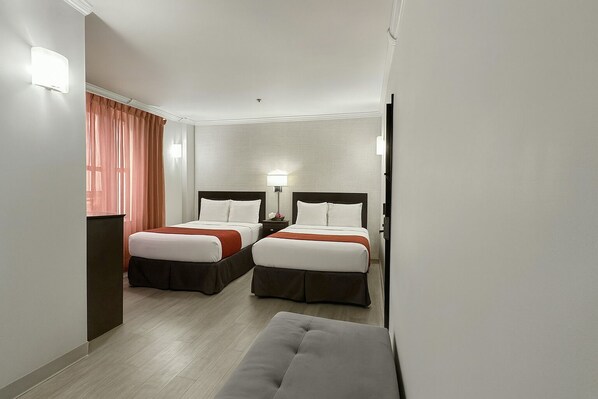 Standard Room, 2 Full Beds, Sofa, Non Smoking | In-room safe, desk, blackout curtains, iron/ironing board