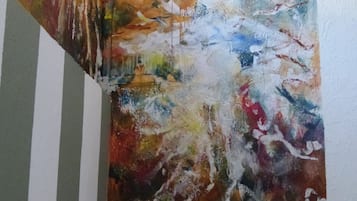 A textured wall with a light fixture.
