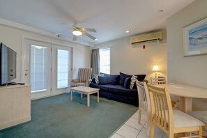 Family Suite, 2 Bedrooms, Non Smoking | Living room | 42-inch LED TV with cable channels, TV