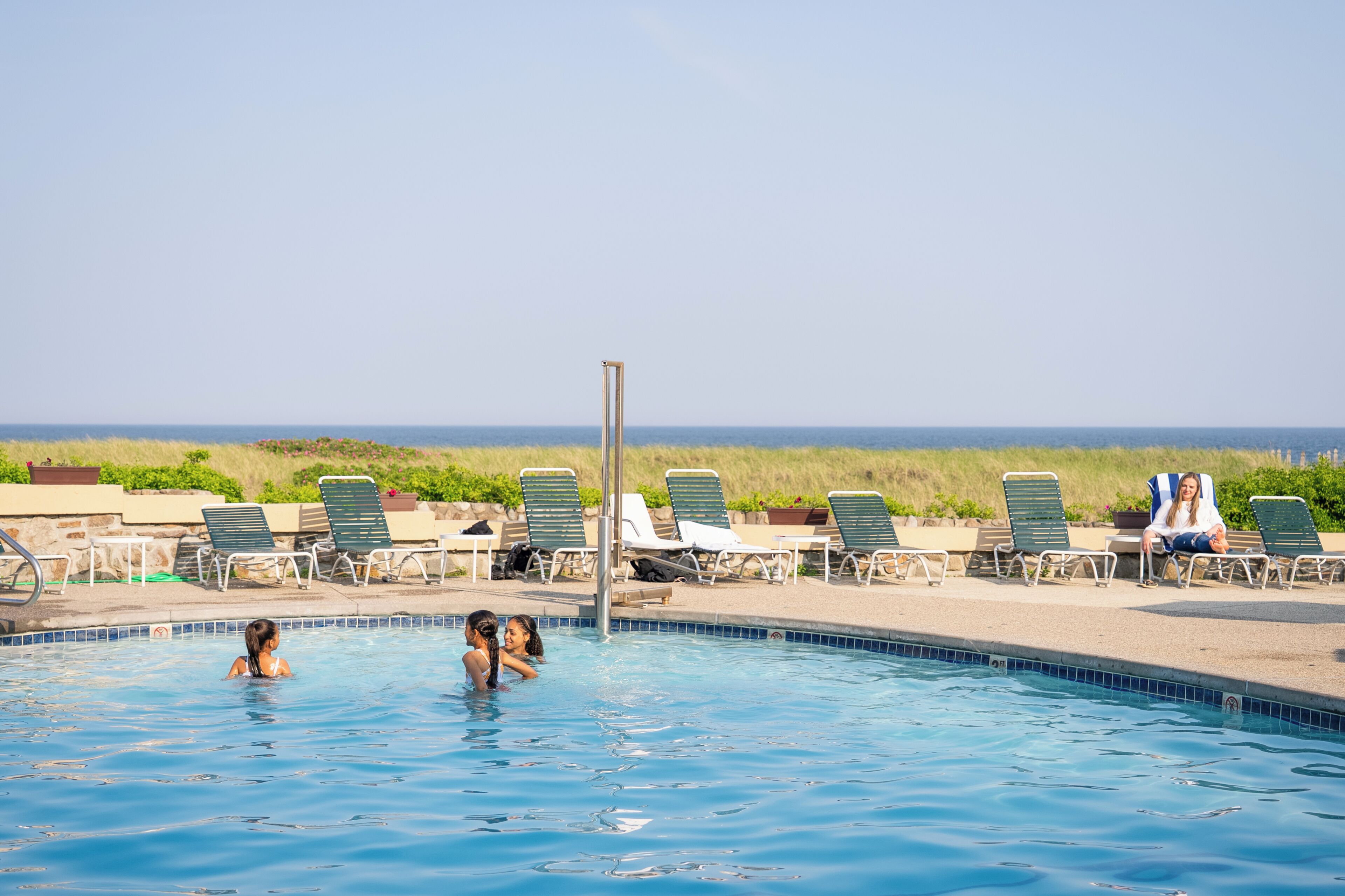 Outdoor pool, open 9:00 AM to 10:00 PM, pool umbrellas, sun loungers