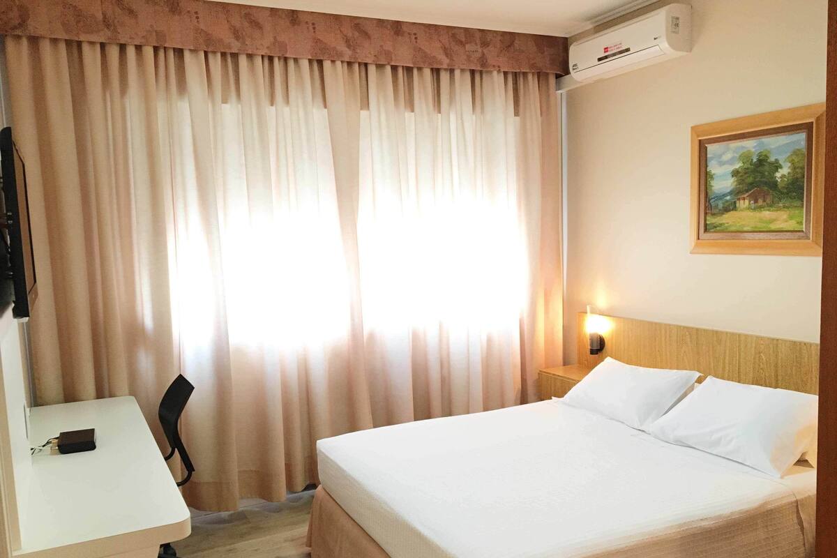 Family Room, 2 Bedrooms | Minibar, in-room safe, desk, laptop workspace