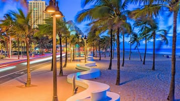 Beach nearby, white sand, beach towels