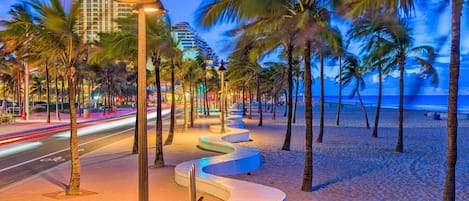 Beach nearby, white sand, beach towels