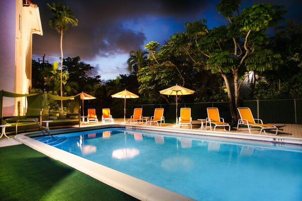 Outdoor pool, open 8:00 AM to 7:00 PM, free cabanas, pool umbrellas