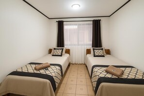 Twin Room | Premium bedding, desk, laptop workspace, blackout drapes