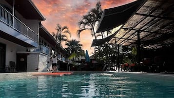 2 outdoor pools, pool umbrellas, pool loungers