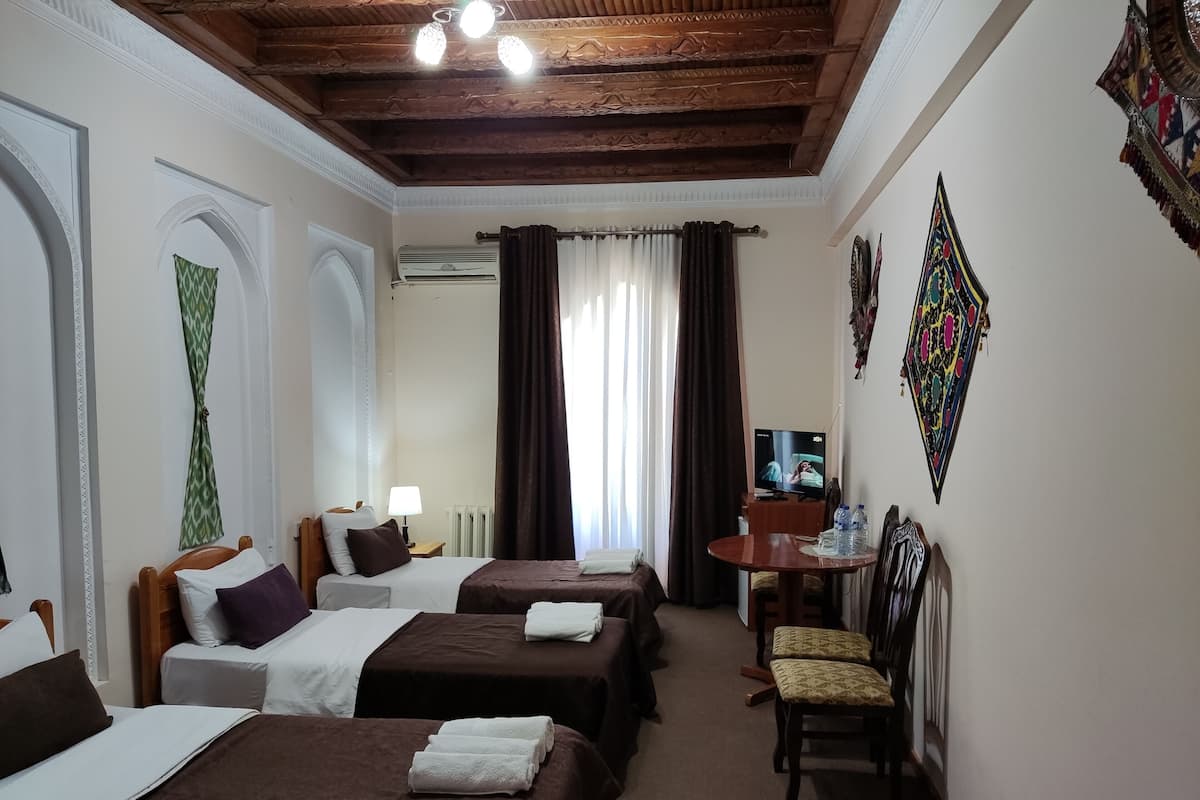 Standard Triple Room | Individually decorated, desk, laptop workspace, blackout curtains