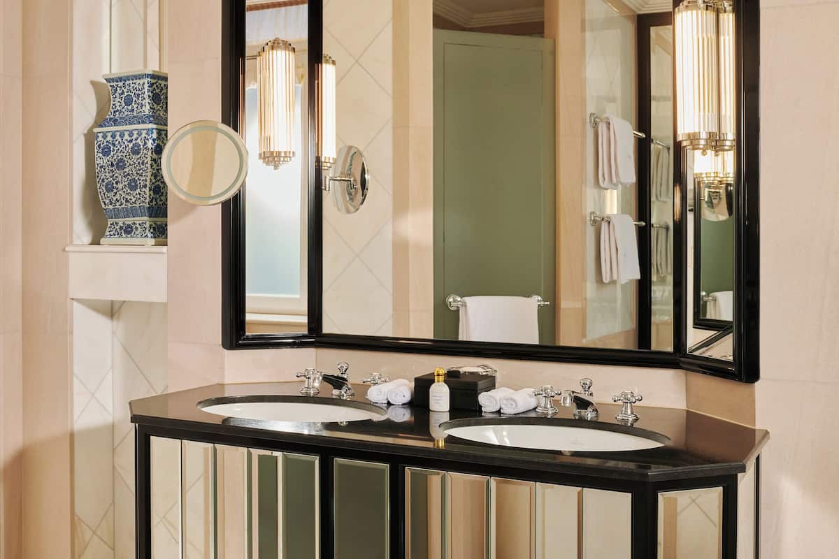 double room | bathroom | separate bathtub and shower, designer toiletries, hair dryer, bathrobes