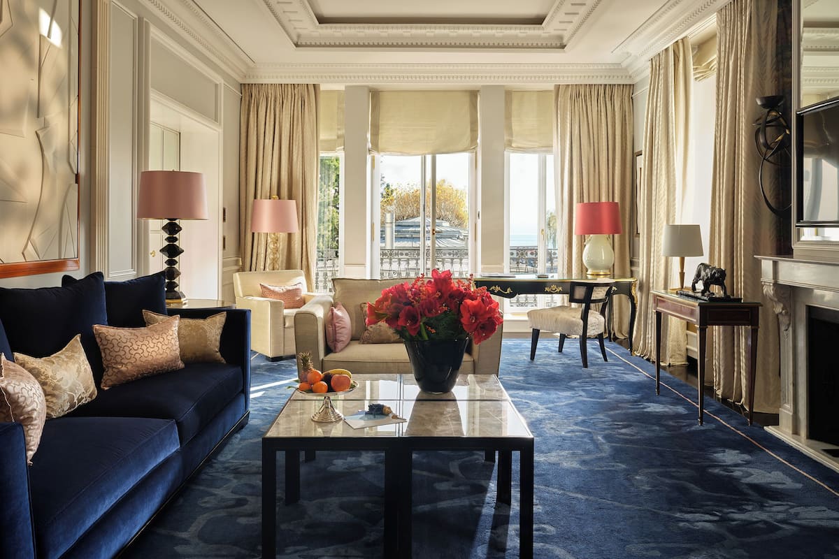 suite, lakeside (corner) | living area | flat-screen tv, dvd player, pay films