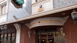 A hotel entrance with a sign reading "Hotel Safi," featuring a traditional facade with patterned tiles and a brick exterior. - Hotel Sapphire (Istanbul)