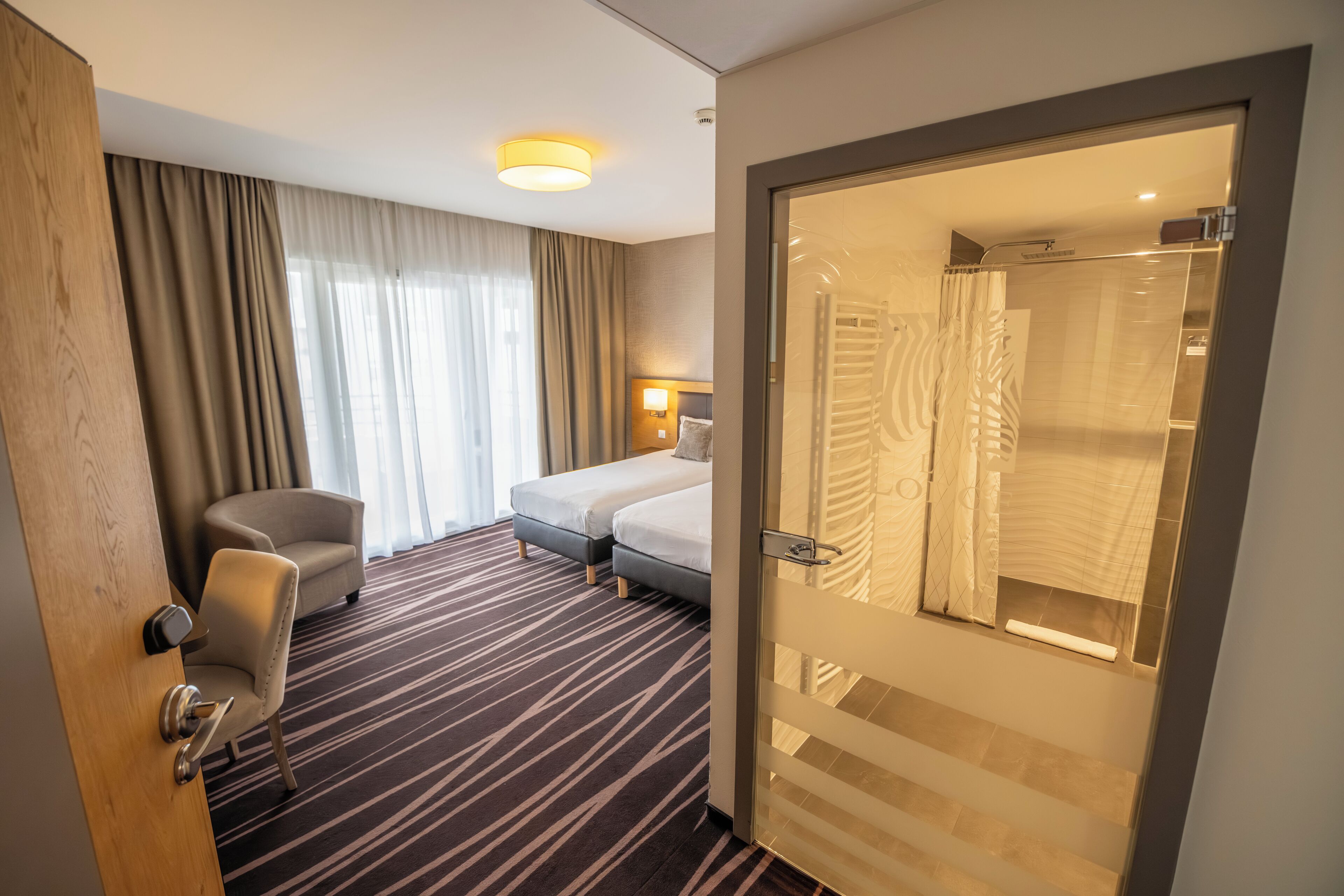 deluxe double or twin room | premium bedding, in-room safe, individually decorated, desk