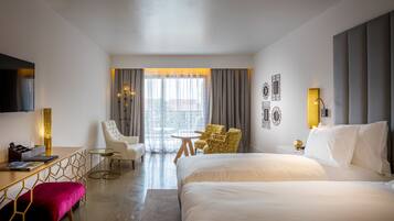 Premium bedding, pillow-top beds, minibar, in-room safe