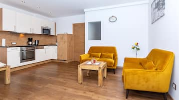Apartment, 2 Bedrooms, Balcony (exkl. Final cleaning and city tax) | Living area | Flat-screen TV, heated floors
