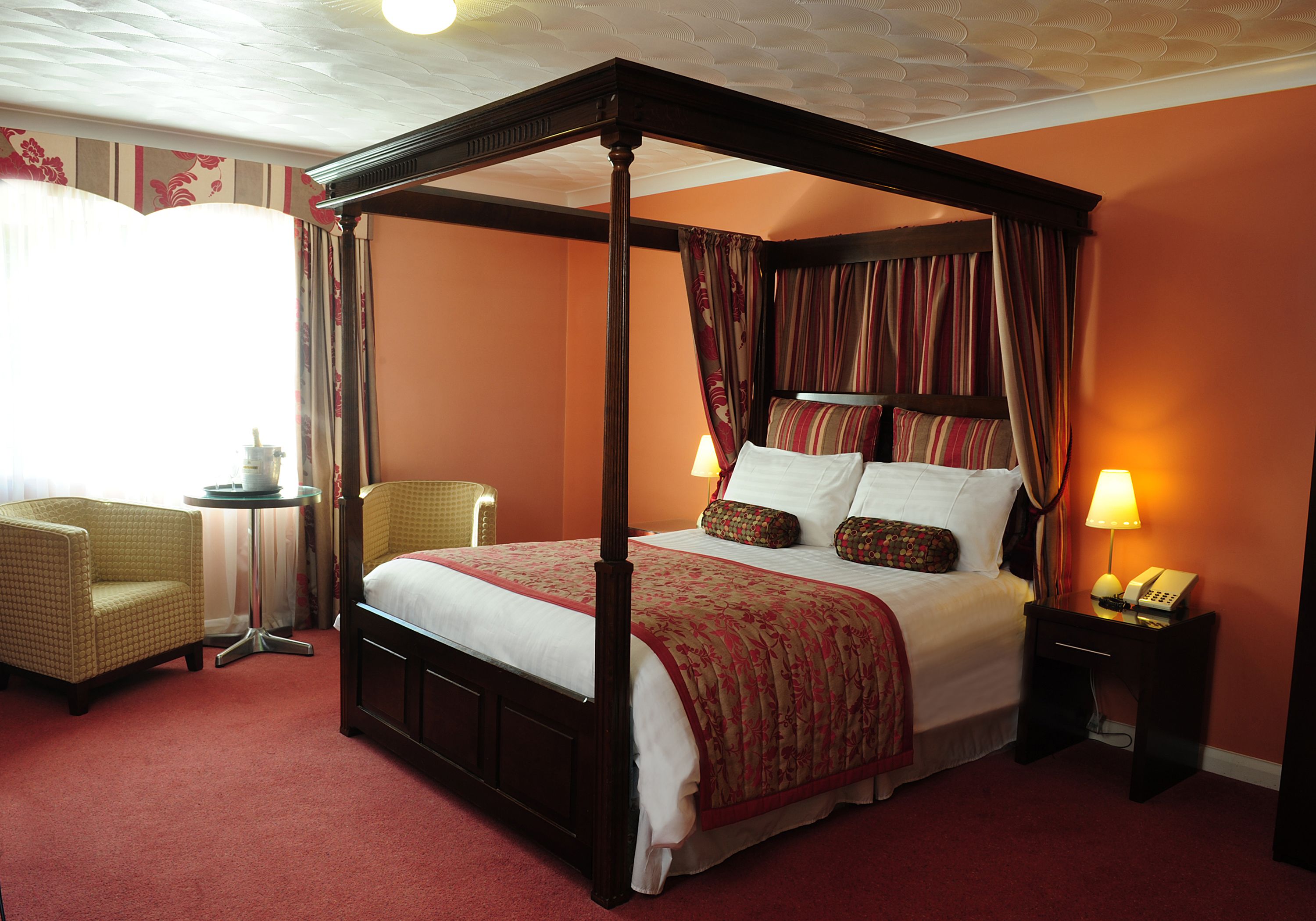 luxury room | in-room safe, desk, iron/ironing board, cots/infant beds