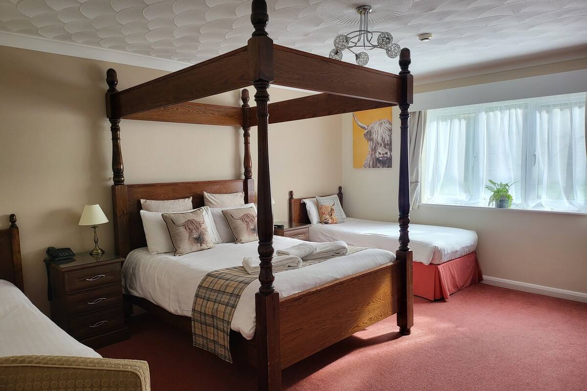 luxury room | in-room safe, desk, iron/ironing board, cots/infant beds