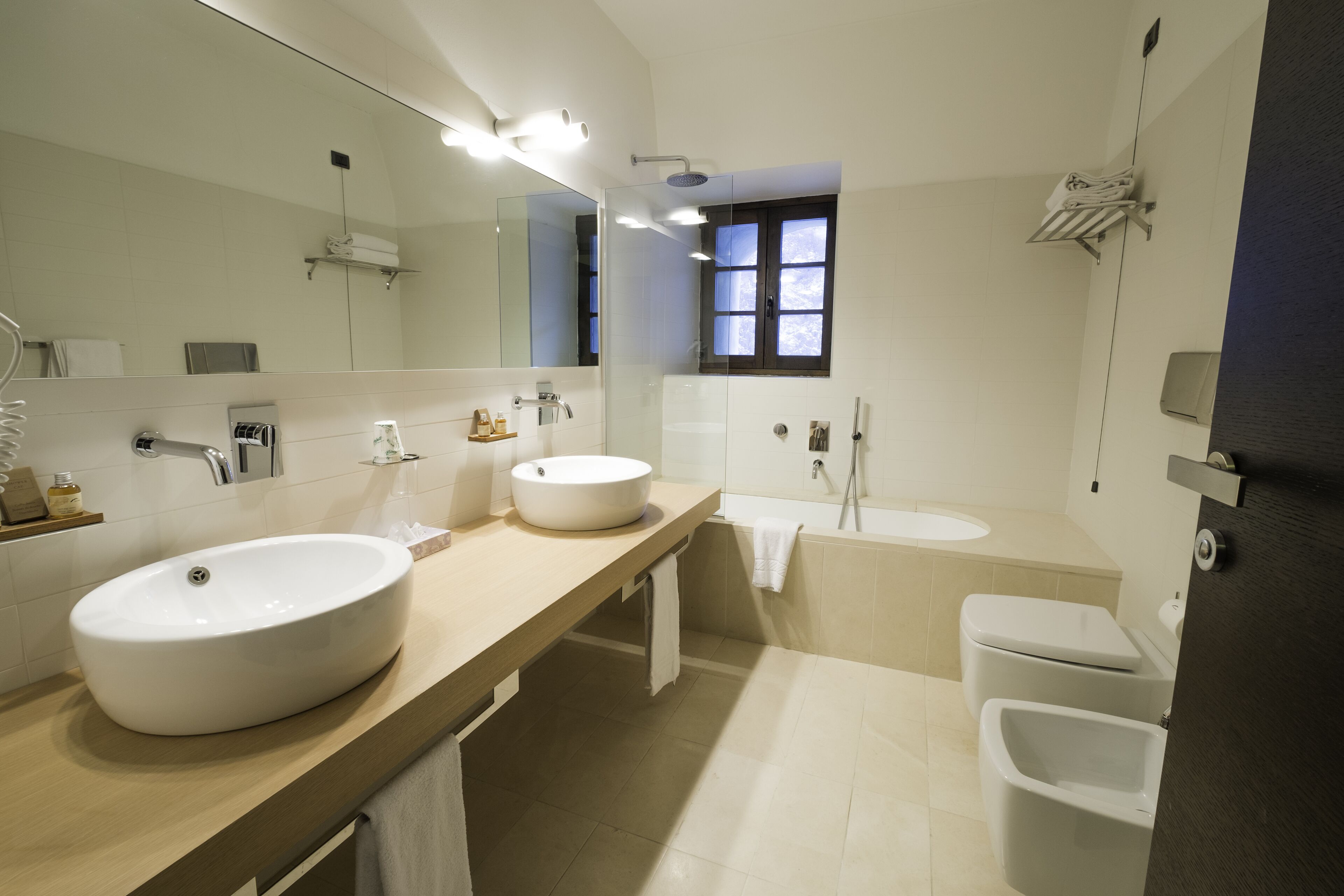 junior suite, balcony | bathroom | combined shower/bathtub, rainfall showerhead, free toiletries