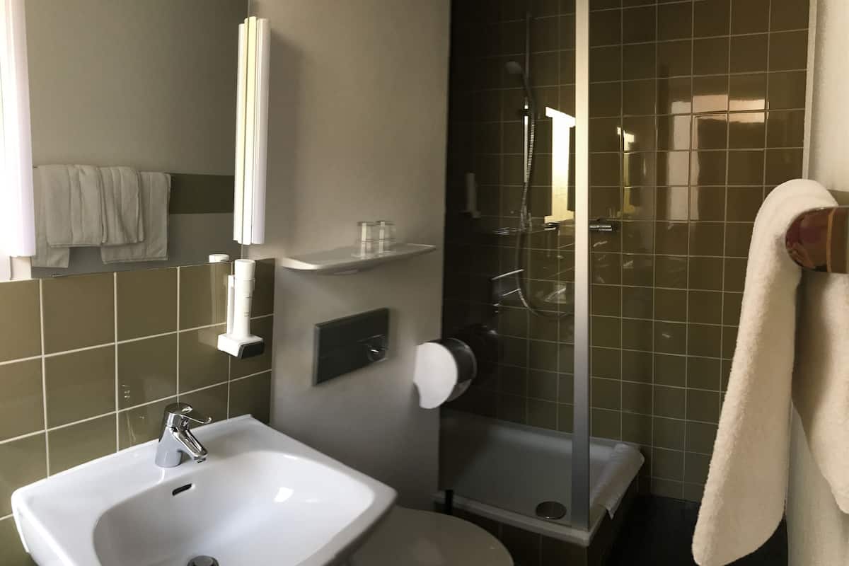 standard double room | bathroom | hair dryer, towels