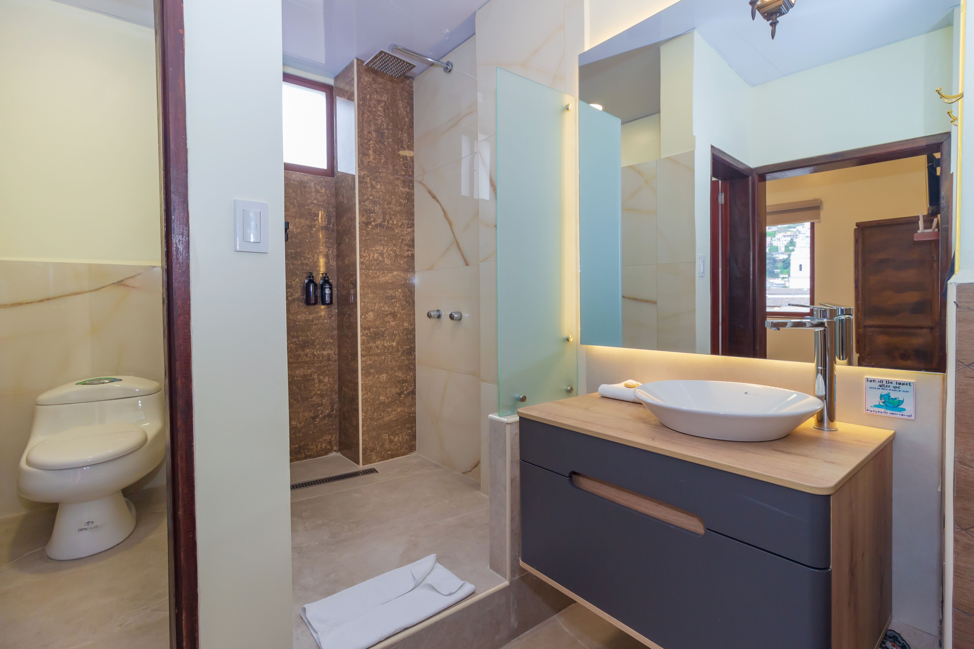 deluxe double room | bathroom | bathtub, designer toiletries, towels, soap