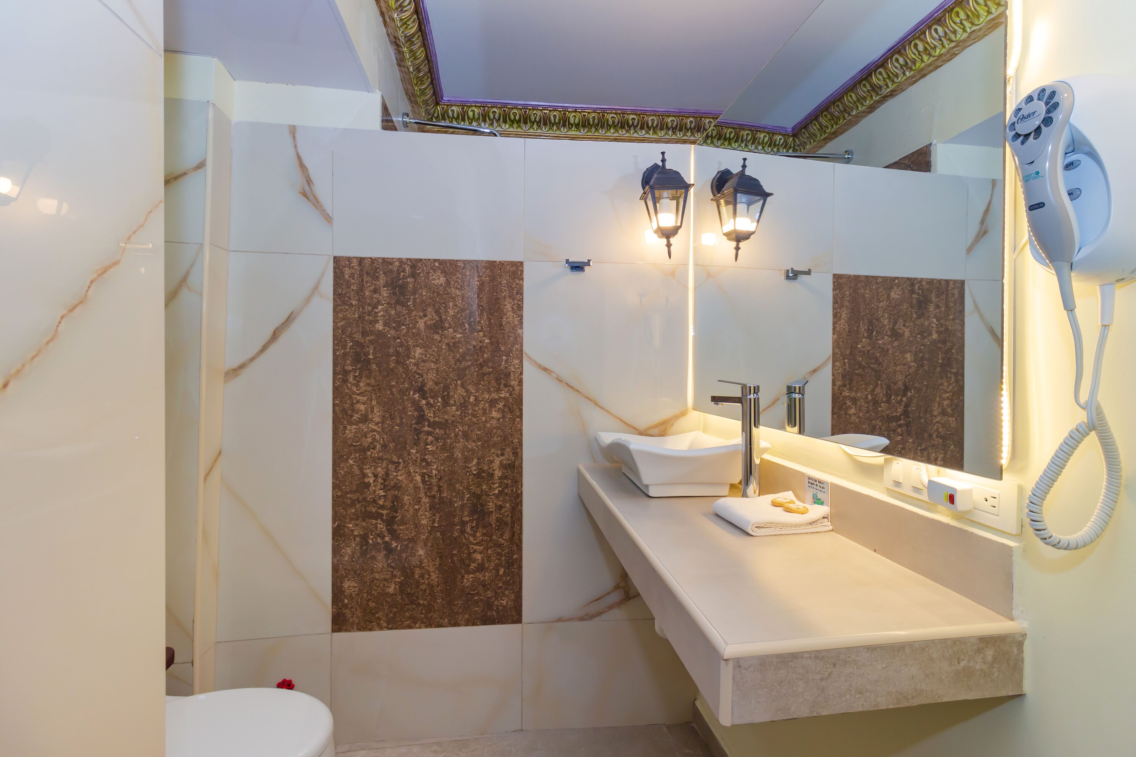 bathtub, designer toiletries, towels, soap