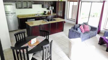 Full-size fridge, microwave, stovetop, dishwasher