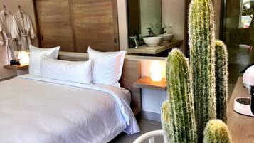 Standard Suite, 1 Bedroom, Ground Floor | Egyptian cotton sheets, premium bedding, Select Comfort beds, minibar