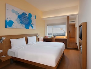 Premium bedding, memory foam beds, minibar, in-room safe