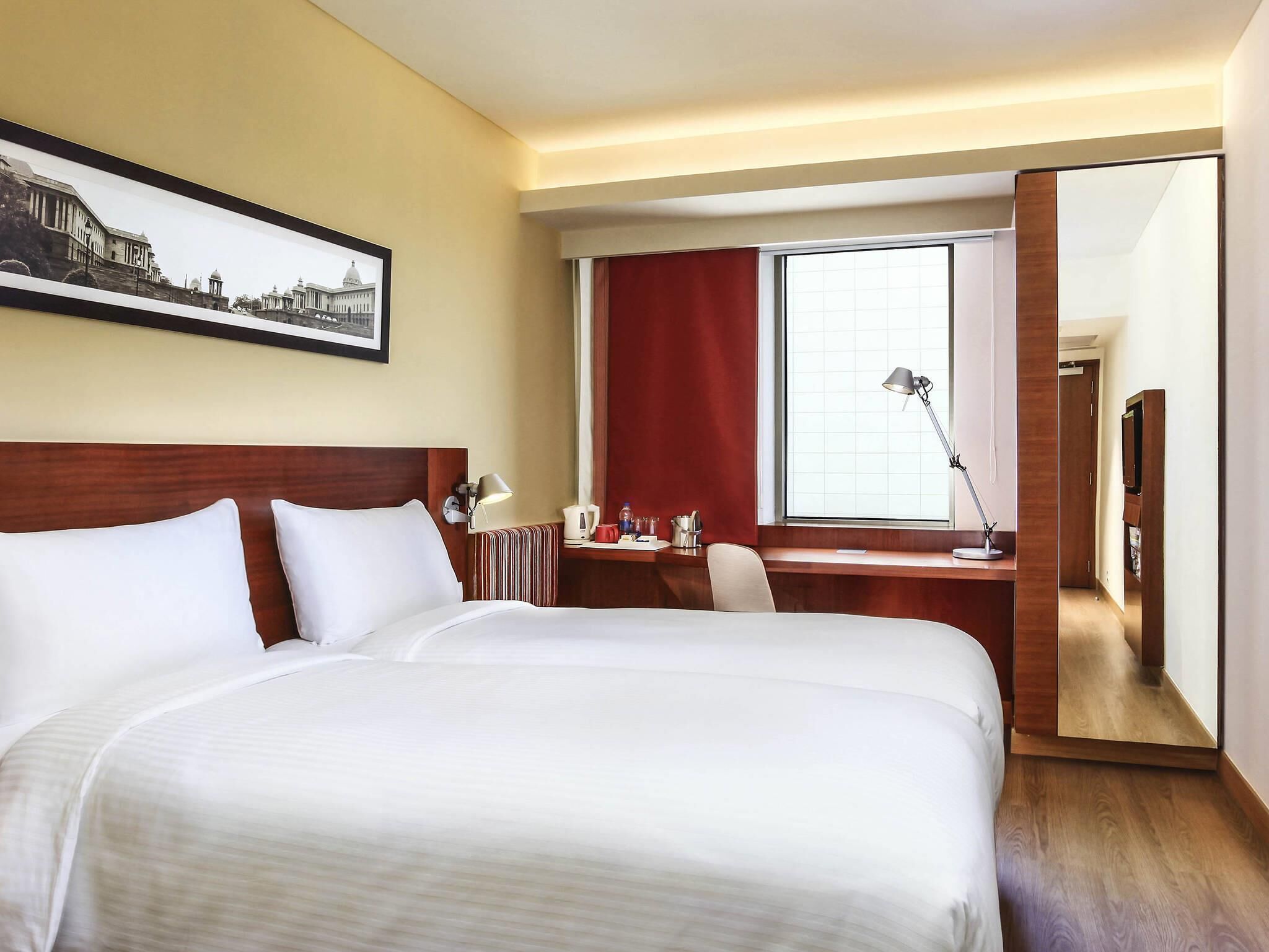 Literie de qualité supérieure, matelas mémoire de forme, minibar