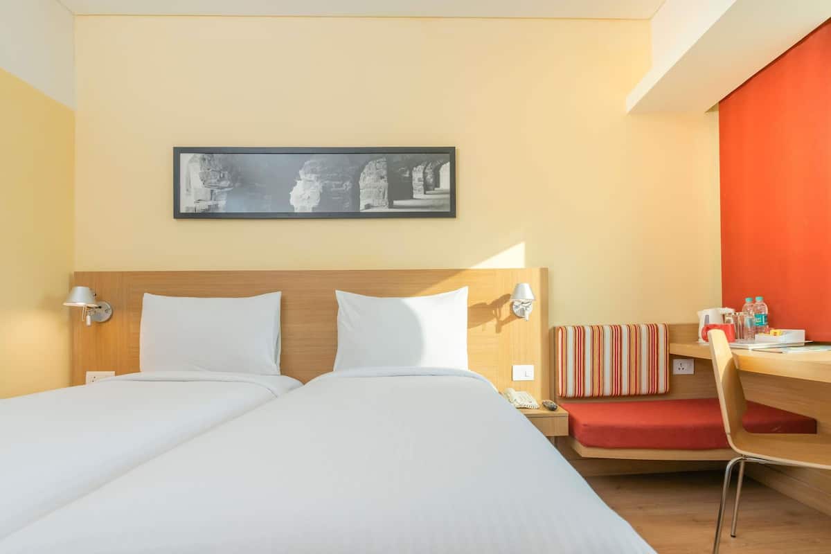 Literie de qualité supérieure, matelas mémoire de forme, minibar