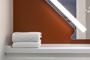 Triple Room, Multiple Beds | Bathroom | Shower, eco-friendly toiletries, hair dryer, towels