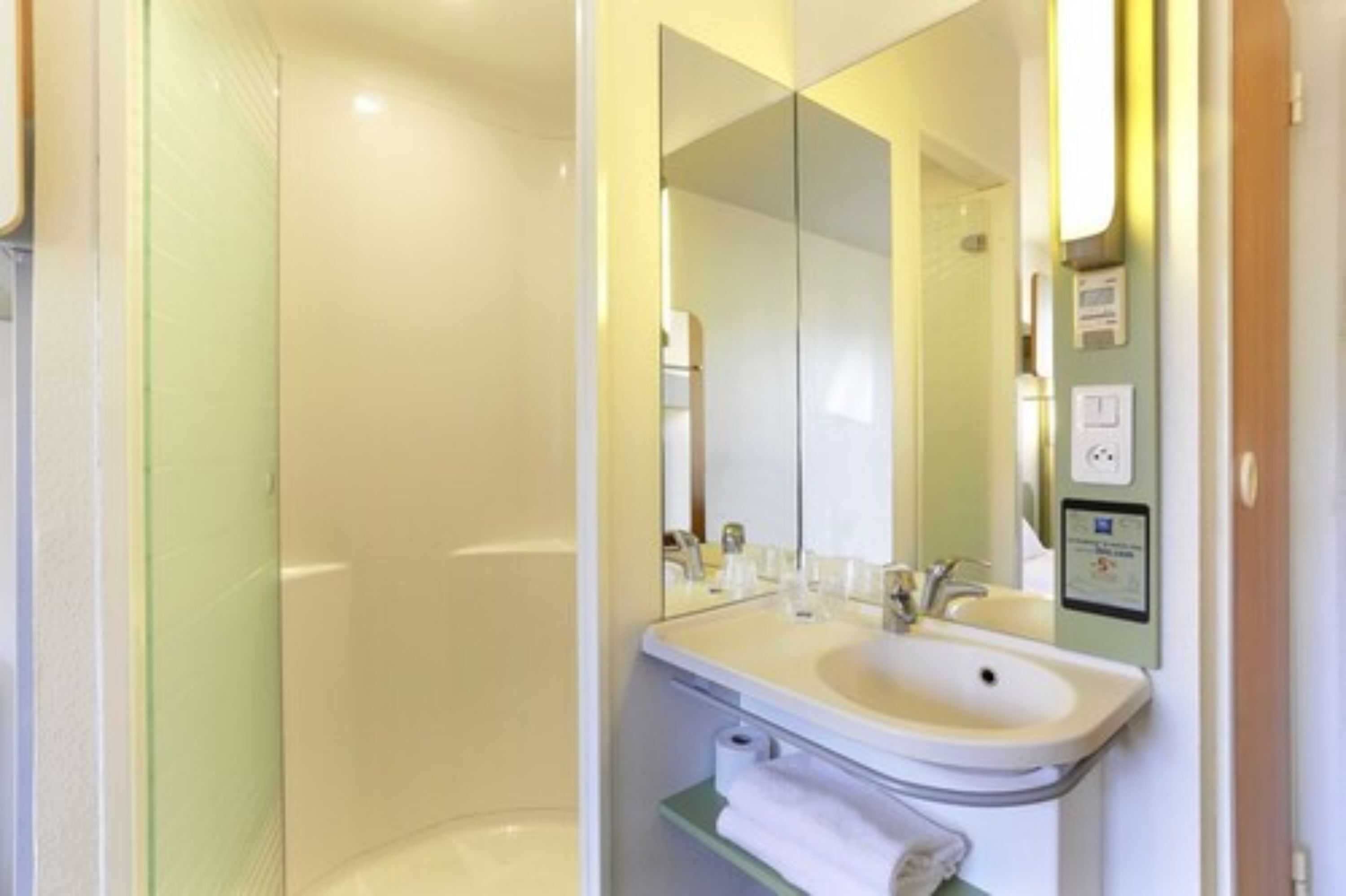 shower, eco-friendly toiletries, hair dryer, towels