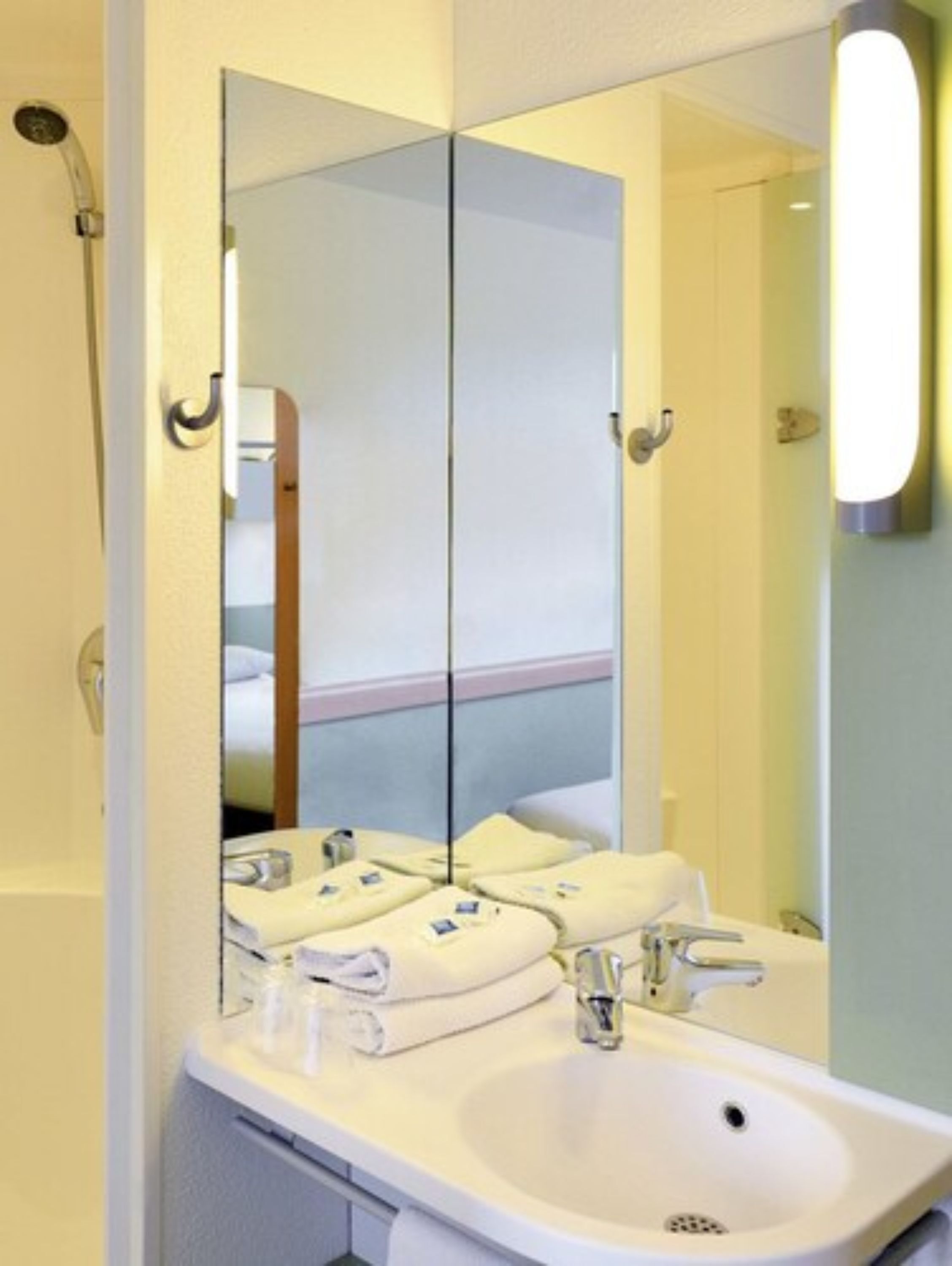 shower, eco-friendly toiletries, hair dryer, towels