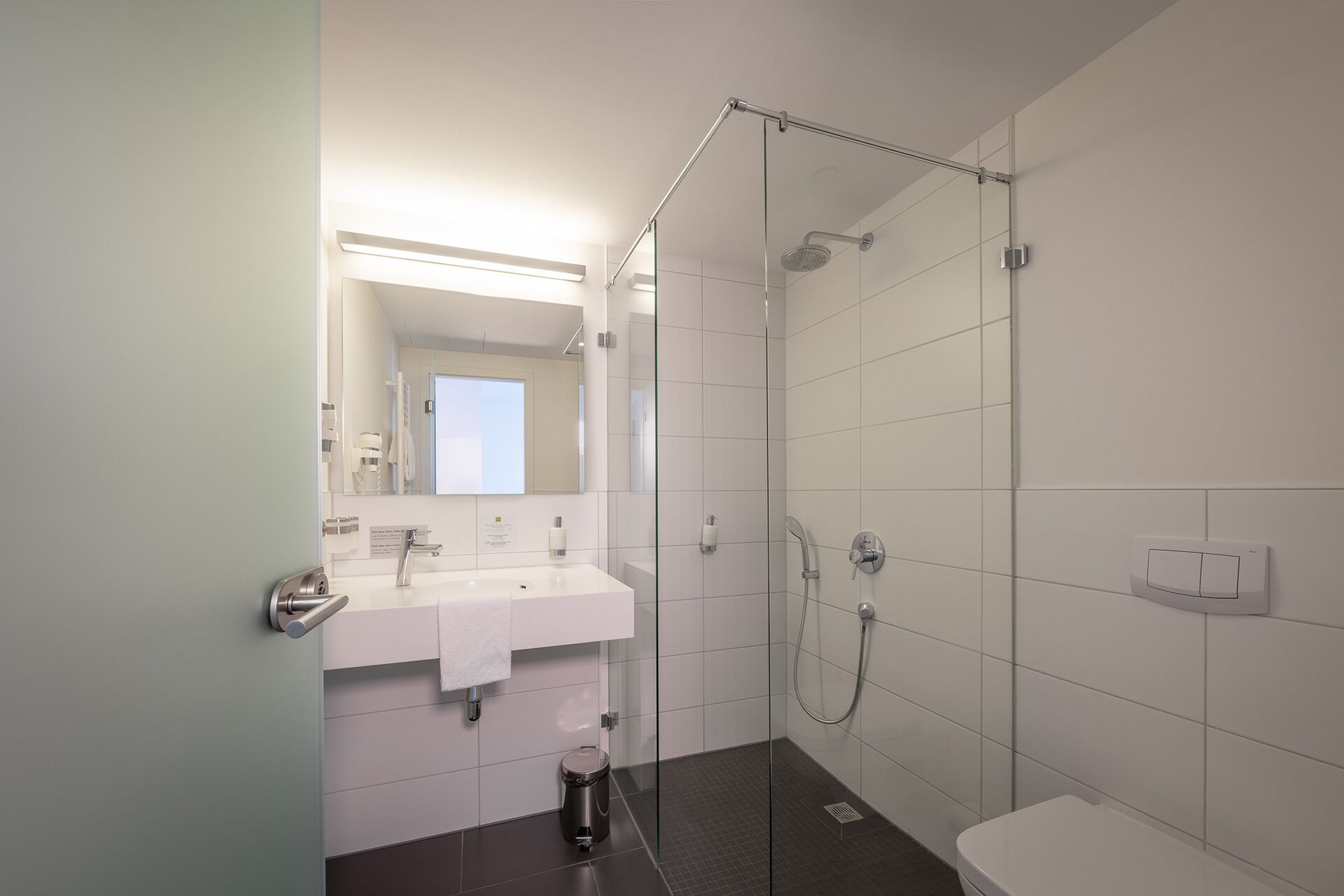 comfort double or twin room (kitchenette on request) | bathroom | shower, rainfall showerhead, hair dryer, towels