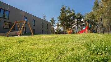 Enjoy a family-friendly stay with a playground and outdoor recreational space.