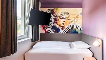 Desk, blackout drapes, soundproofing, free WiFi