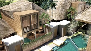 A modern resort with a pool, wooden structures, and a balcony. - The Edelweiss Ultimo Canggu (Cemagi)