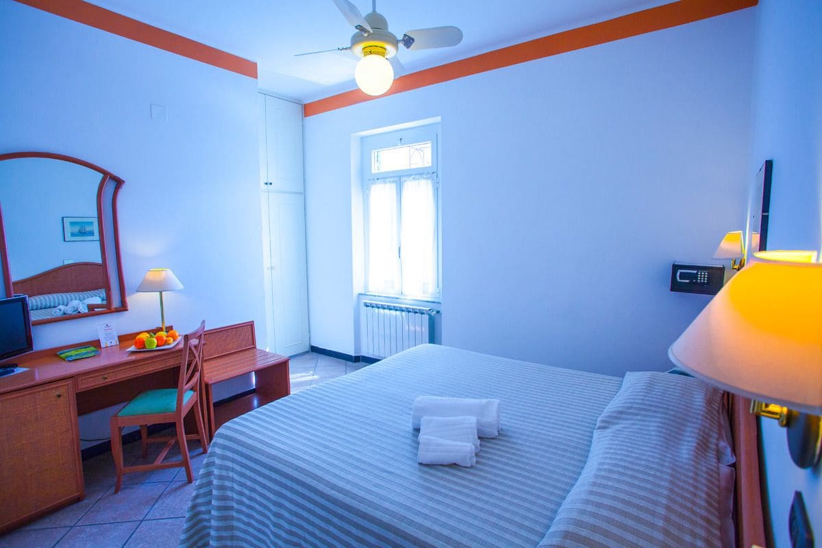 double or twin room | minibar, in-room safe, desk, laptop workspace