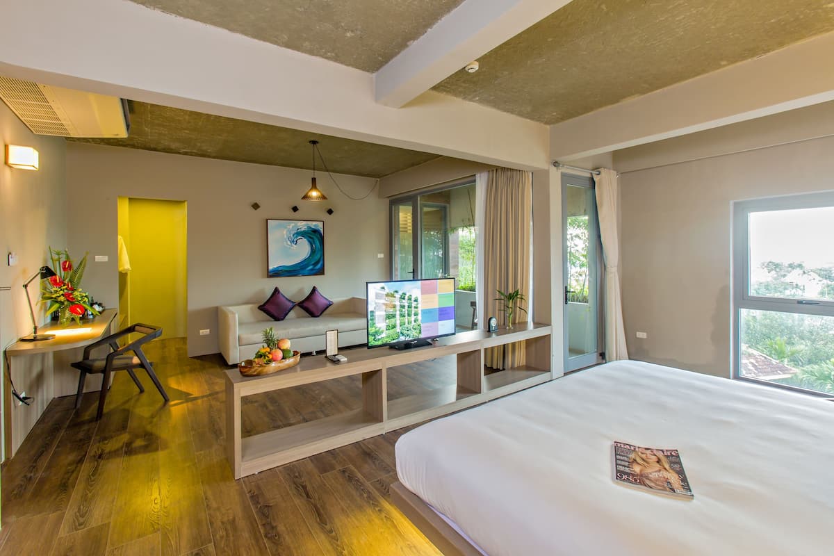 Suite, Garden View (or Pool View) | 1 bedroom, premium bedding, down comforters, minibar