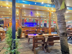 Breakfast, lunch, dinner served; international cuisine, beach views 