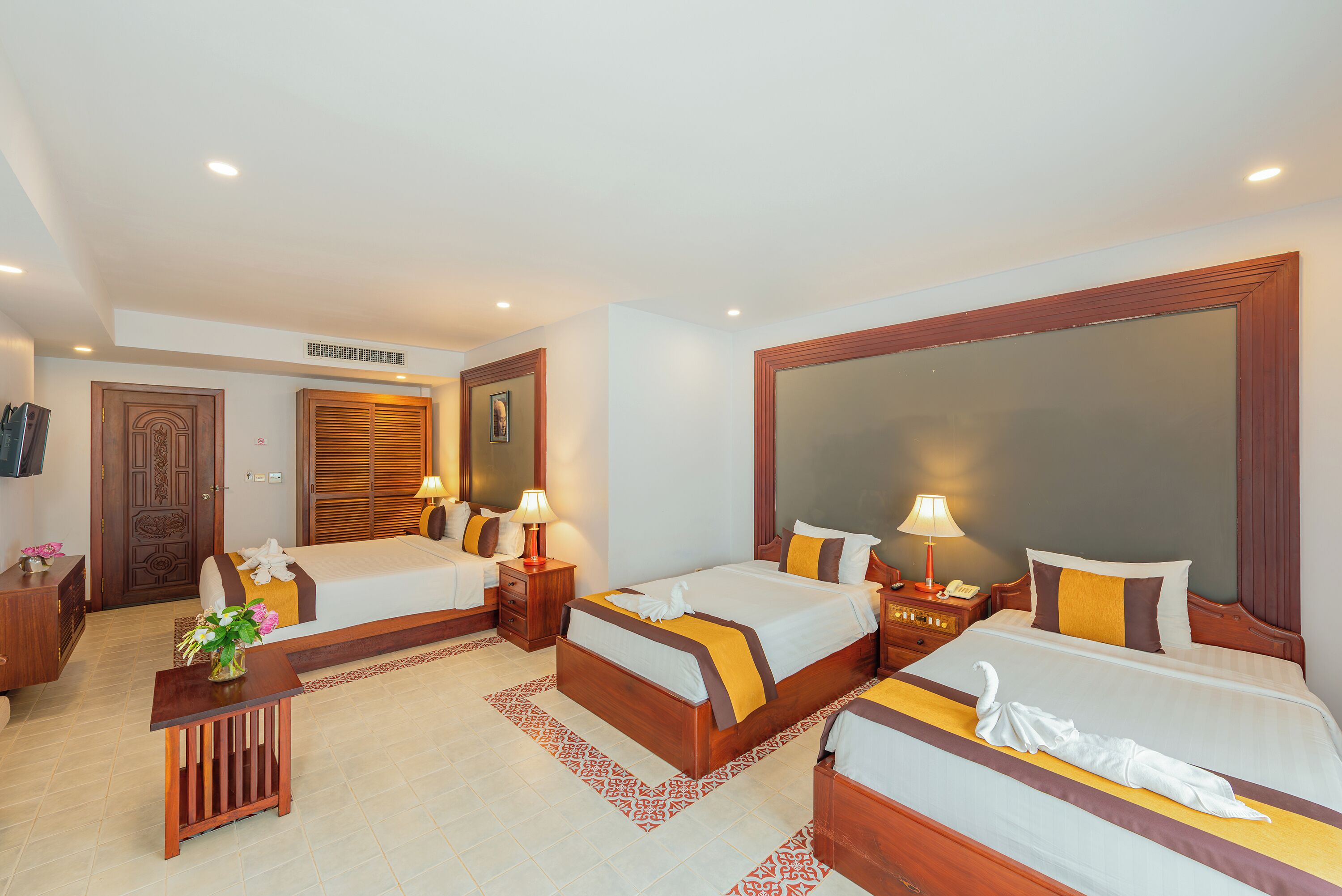 family room | 1 bedroom, minibar, in-room safe, desk