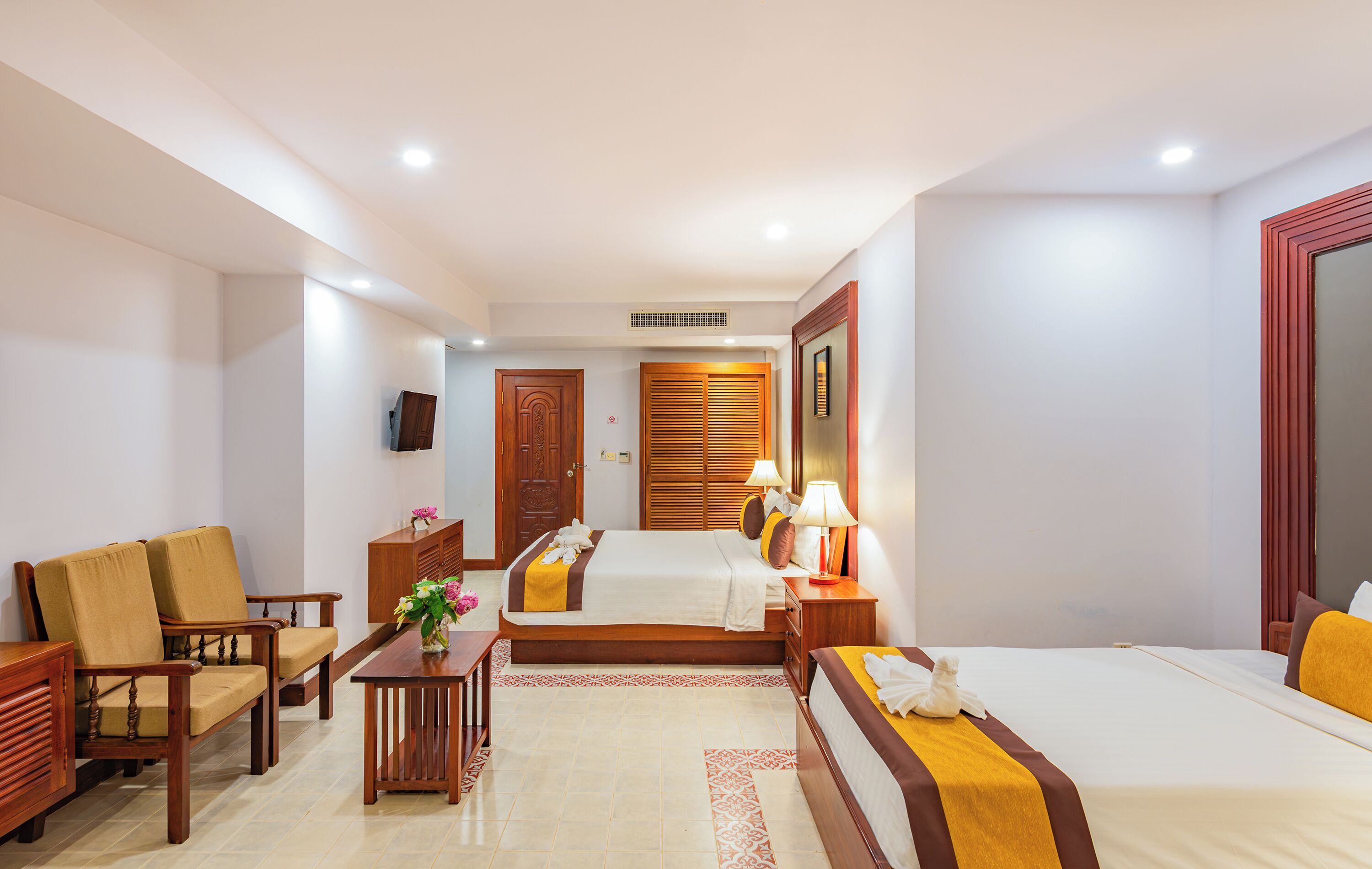 family room | 1 bedroom, minibar, in-room safe, desk