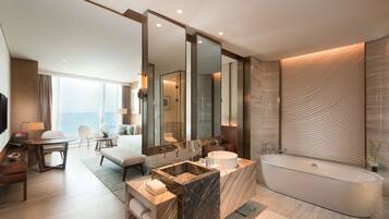 King Deluxe Sea View | Bathroom | Combined shower/tub, hydromassage showerhead, hair dryer, bathrobes
