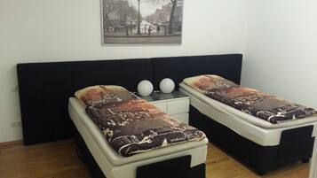 Business Apartment, 3 Bedrooms | 3 bedrooms, blackout drapes, free WiFi