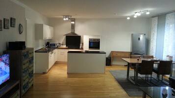 Business Apartment, 3 Bedrooms | Living area | Flat-screen TV