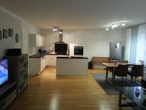 Business Apartment, 3 Bedrooms | Living area | Flat-screen TV