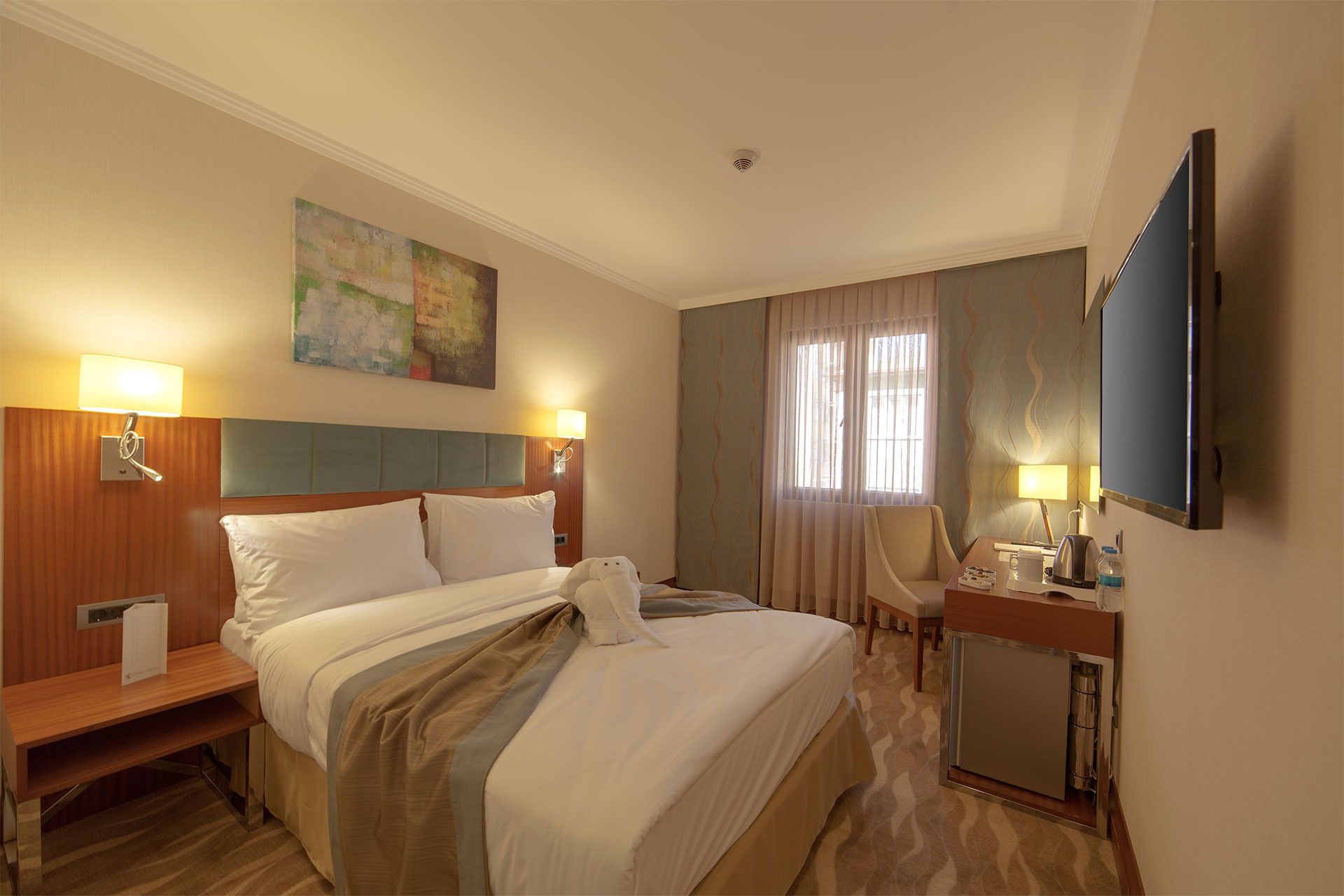 egyptian cotton sheets, down duvets, minibar, in-room safe